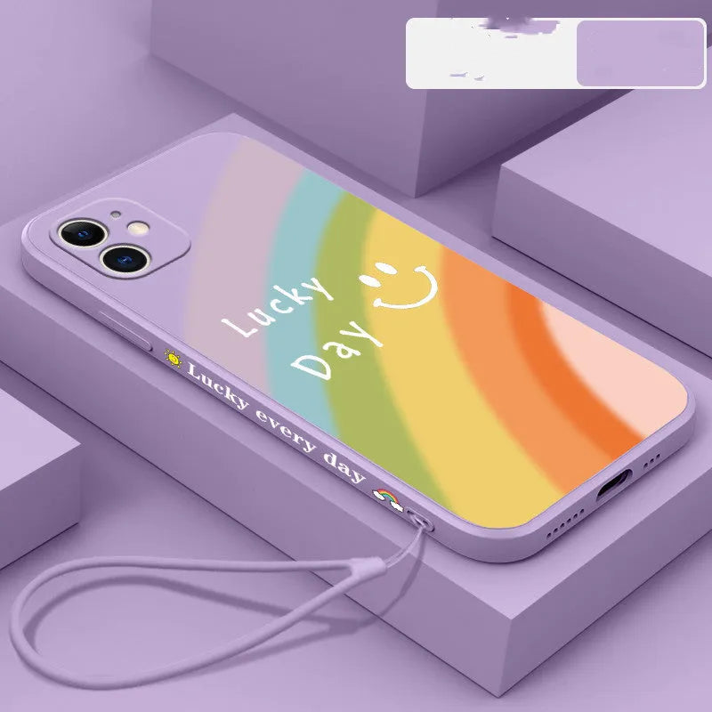 Rainbow smiley face design on a blue silicone phone case for iPhone XR