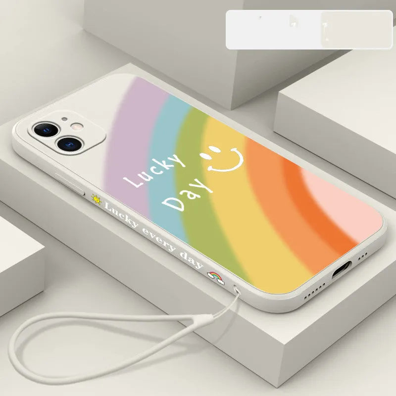 Rainbow smiley face design on a blue silicone phone case for iPhone XR
