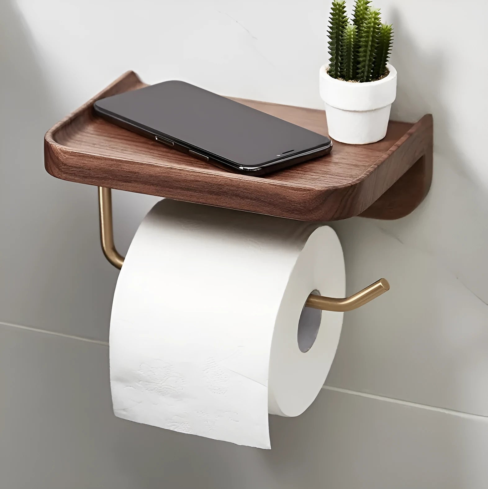 Solid walnut wood wall-mounted paper towel holder with brass fittings in natural wood colour.