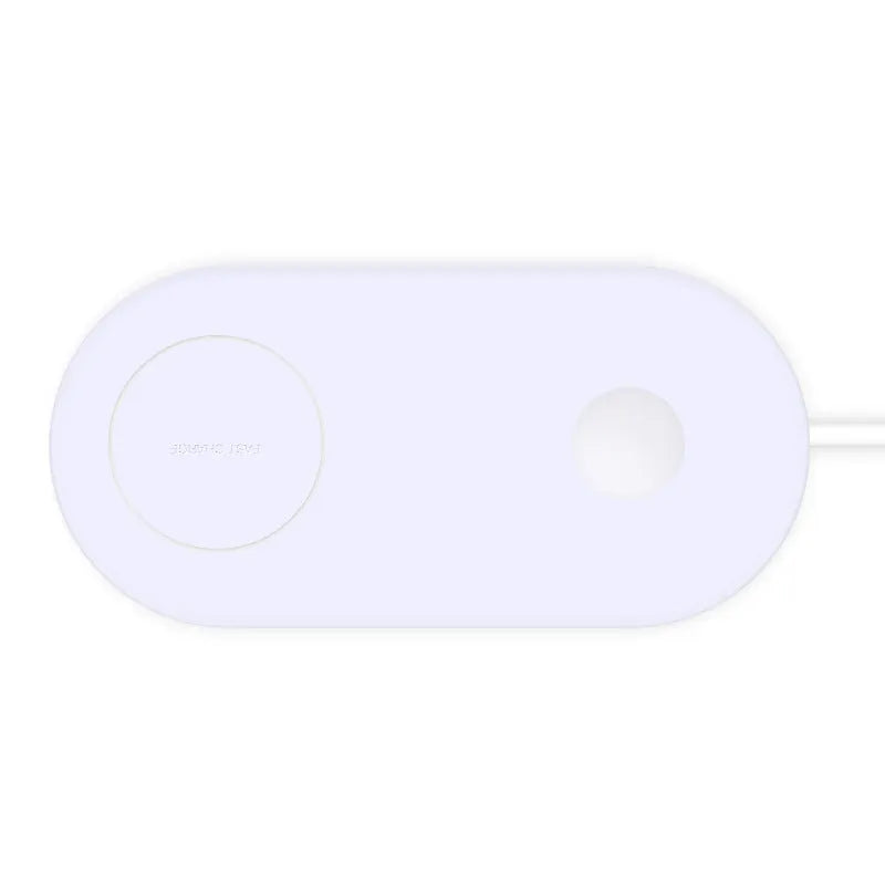 White dual wireless phone charger charging two mobile phones simultaneously on tabletop
