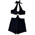 Women's gathered three-point one-piece swimsuit in black with floral print, open back, and built-in chest pad