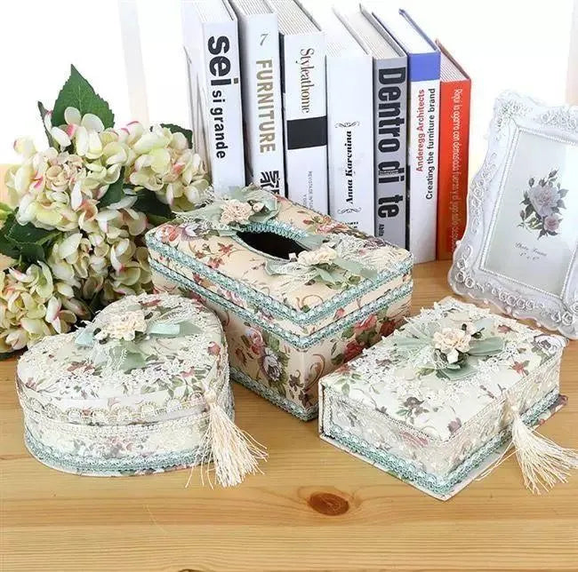 Ceramic jewellery and tissue box in bright pink with earring storage on top and tissue slot below.