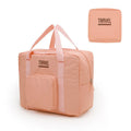 Black cube-shaped oxygen travel storage bag with a seal, shown next to a grey and a pink version.