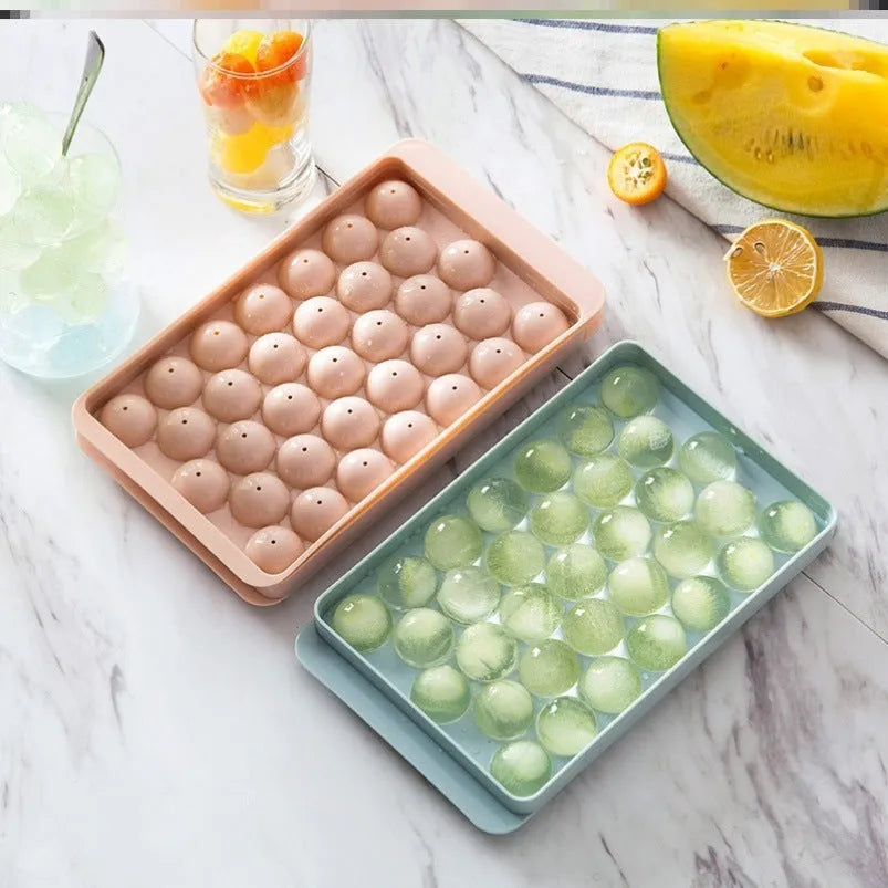 Sky blue 3D round ice ball mould tray with spherical ice cavities for home bar use