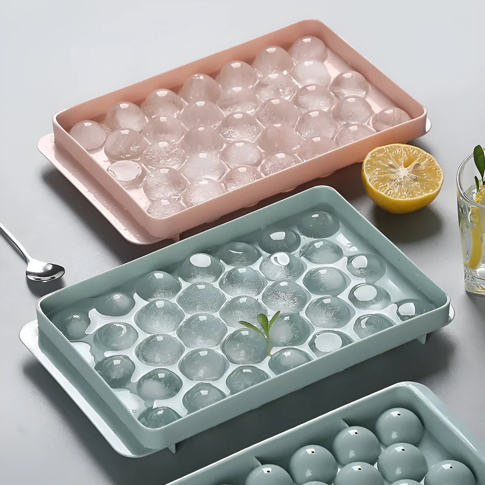 Sky blue 3D round ice ball mould tray with spherical ice cavities for home bar use