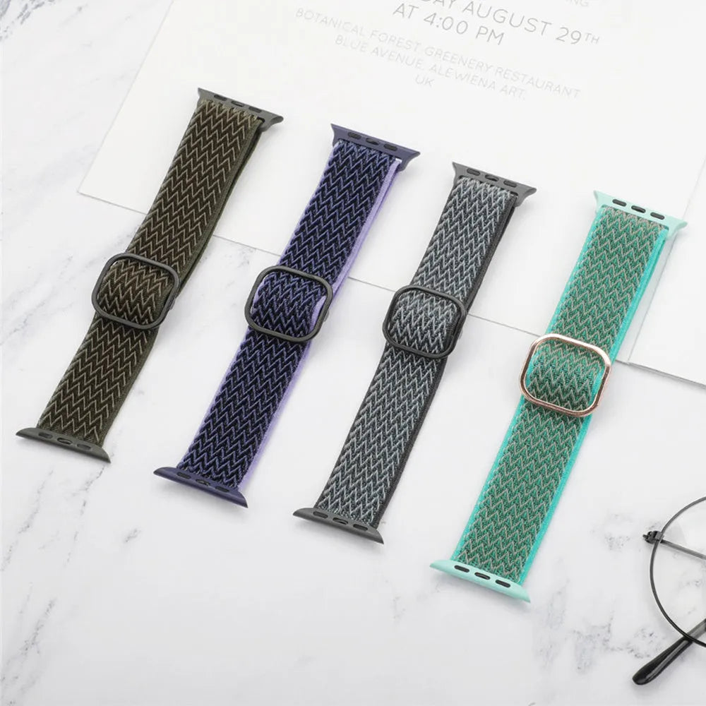 Braided nylon elastic watch strap for Apple Watch in multiple colours on a grey background.