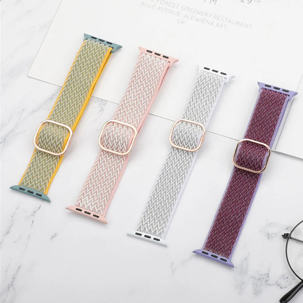 Braided nylon elastic watch strap for Apple Watch in multiple colours on a grey background.