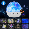 Compact plastic starry sky projector showing constellation night light projection on a wall.