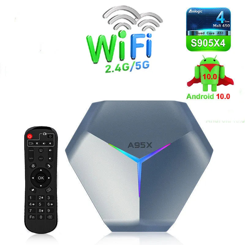 Black 8K Android TV set-top box with remote control and international power plugs on a wooden surface