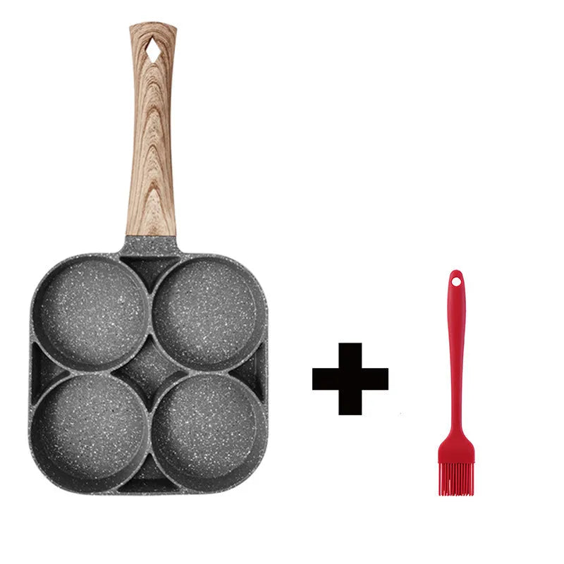 Aluminium four-hole non-stick frying pan with wooden handle for making eggs and burgers.