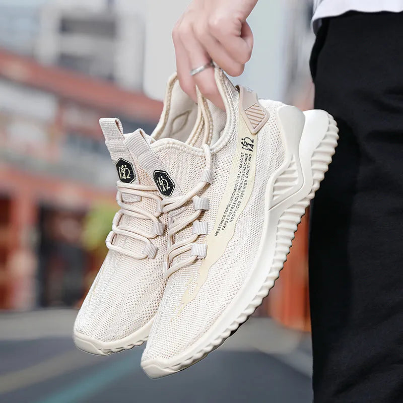 Men's white low-top mesh sports shoes with rubber sole and lace front.