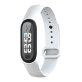 Ultrasonic electronic anti-mosquito bracelet worn on wrist in black, white, blue, or pink colours.