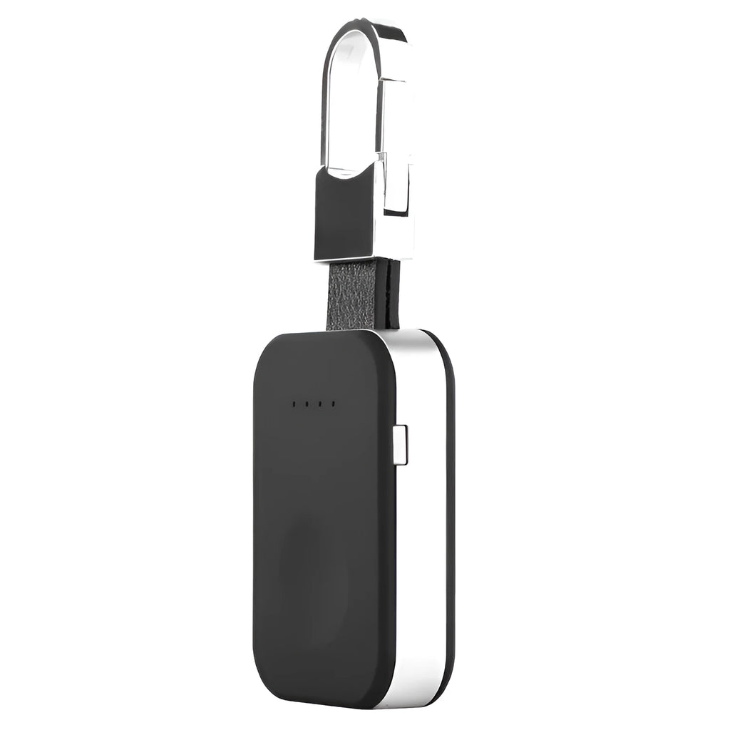 Black keychain-sized wireless power bank for Apple Watch on a keyring.