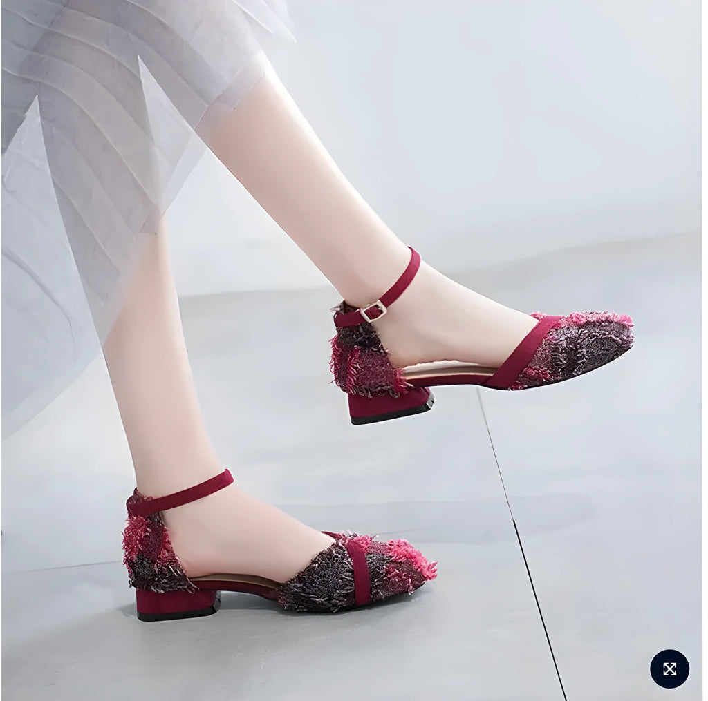 Women's apricot suede ankle strap D'Orsay low-heel flats on a white background.