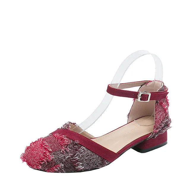 Women's apricot suede ankle strap D'Orsay low-heel flats on a white background.