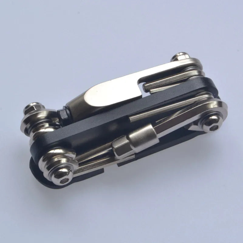 Chrome vanadium steel bicycle repair combination tool in black, red, yellow, or blue, showing compact size.