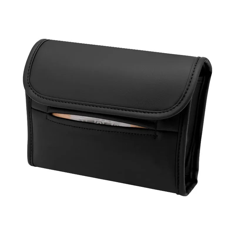Brown leather car tissue box with elastic band, shown mounted on a car sun visor.