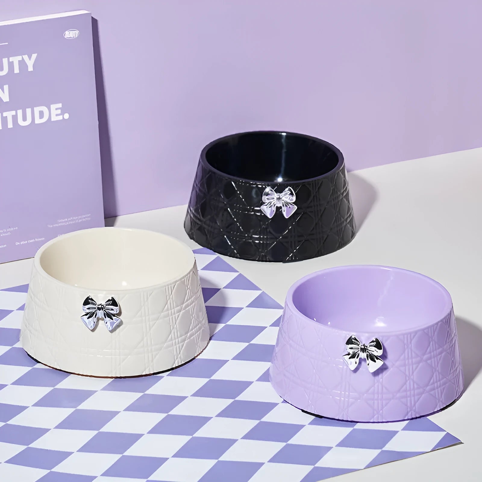 Decorative pet bowl with diamond pattern and bowknot decoration in multiple colour options