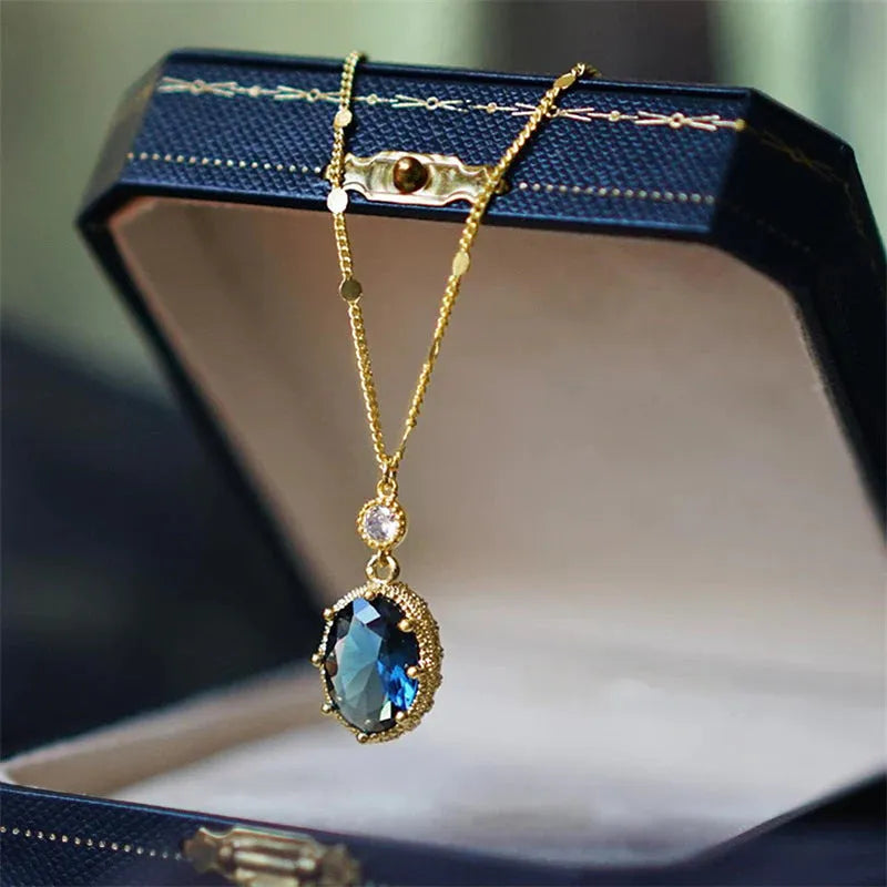 Geometric French retro style copper necklace with a gold electroplated finish.