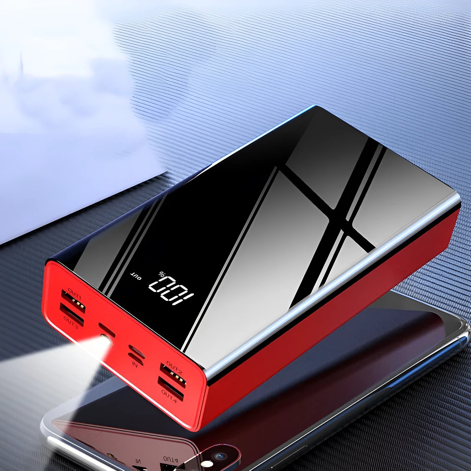 Black and red large 40000mAh power bank with LCD display showing charge level.