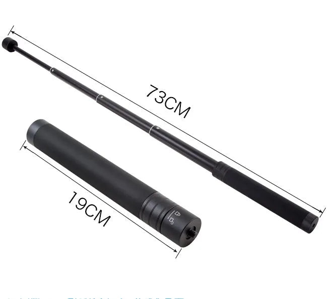 Black retractable selfie stick extended to full length with a smartphone attached, showcasing its hand-held stabiliser grip.
