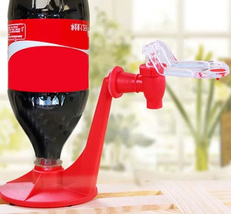 Red plastic Magic Tap manual soda bottle dispenser for 2-litre bottles.