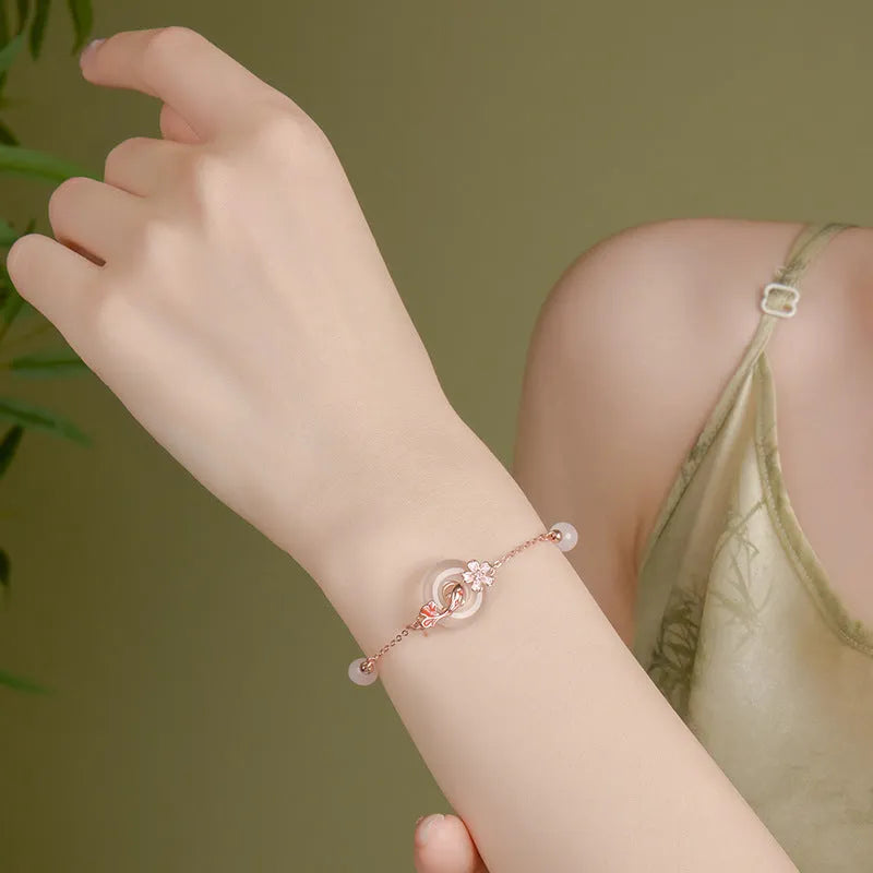 S925 sterling silver bracelet with Chinese flower design and white chalcedony crystals in Koi theme