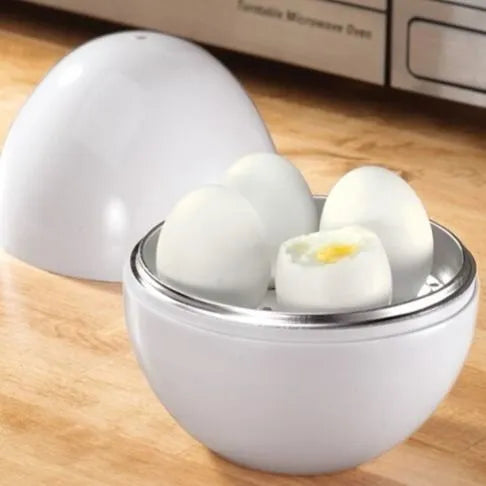 White microwave egg cooker steamer for boiling up to 4 eggs, made from food grade plastic and aluminium.