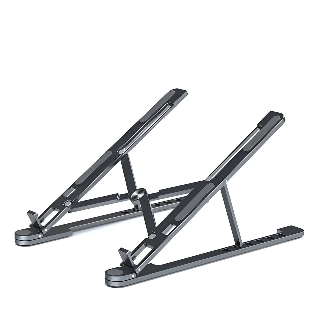 Foldable aluminium laptop stand in silver, shown supporting a laptop at an angle.