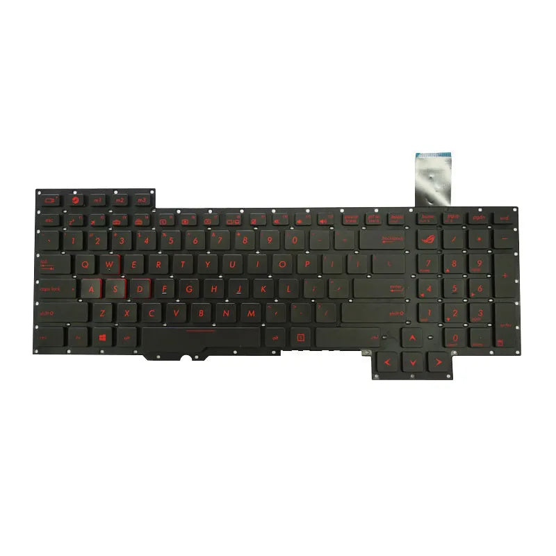 Black wired PS/2 keyboard with multimedia keys on a desk.