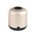 Hieha XQ11 mini cylindrical portable Bluetooth speaker in silver colour on a table