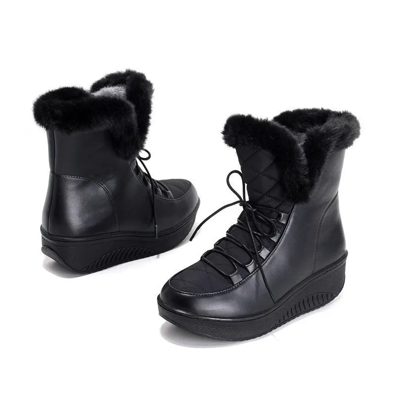 Black women's winter boots with lace-up front, 3cm platform sole, and plush lining.