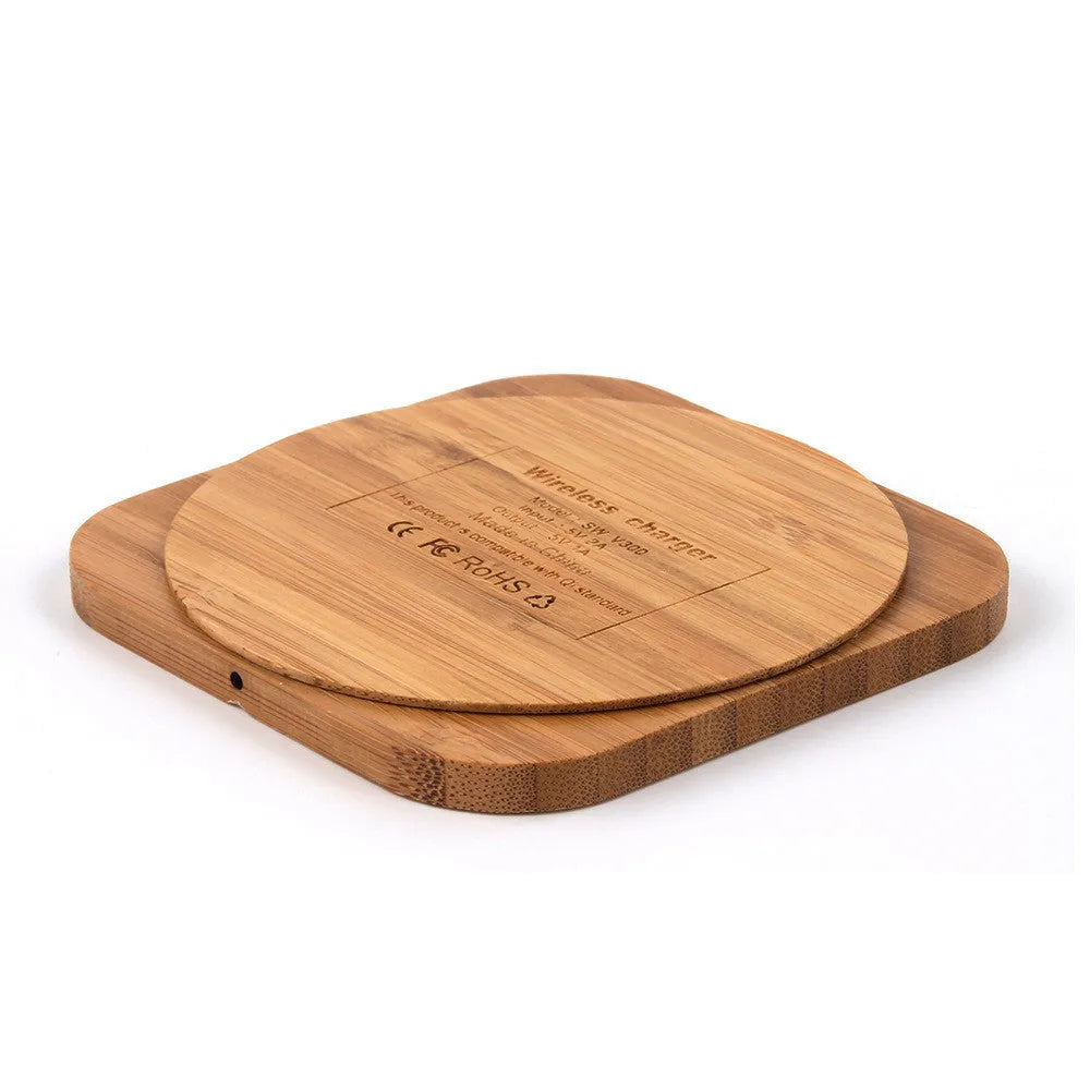 Square wooden bamboo 5W Qi wireless charging pad on a table