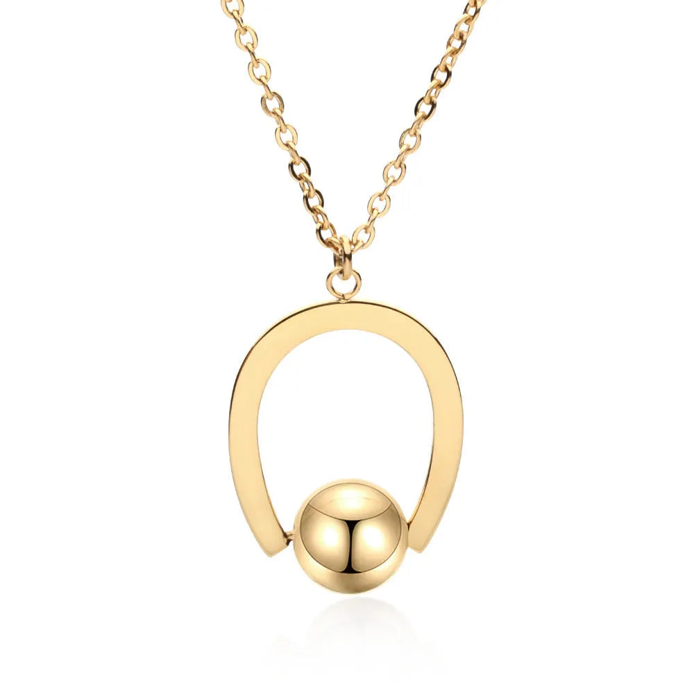 Gold-coloured adjustable stainless steel necklace with a geometry pendant on a cross chain.