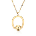 Gold-coloured adjustable stainless steel necklace with a geometry pendant on a cross chain.