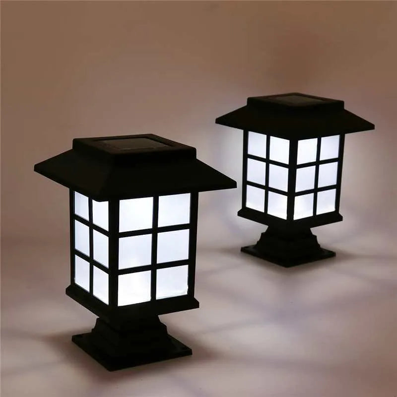 Black solar outdoor LED lawn light with window-style design for garden and pathway illumination