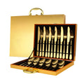 24 piece stainless steel tableware set showing knives, forks, and spoons in multiple colour finishes