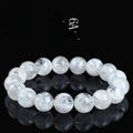 Women's crystal bracelet with blizzard snowflake round beads and Ruyi design in geometric shape.
