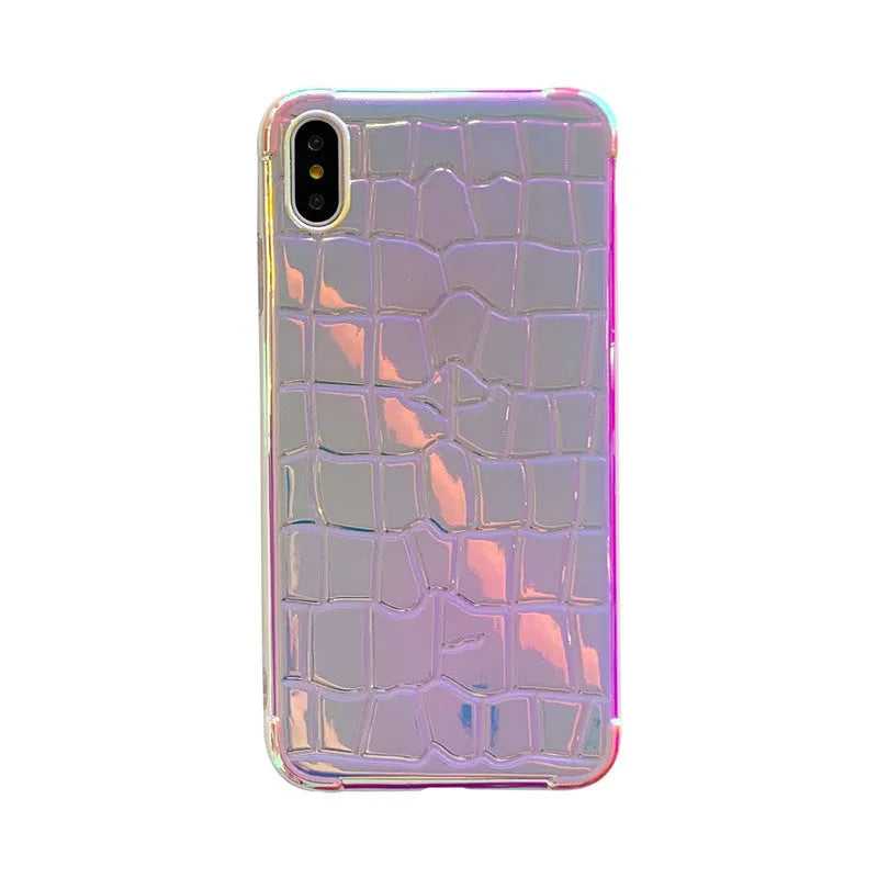 Silver glossy laser design silicone case for iPhone on a table.