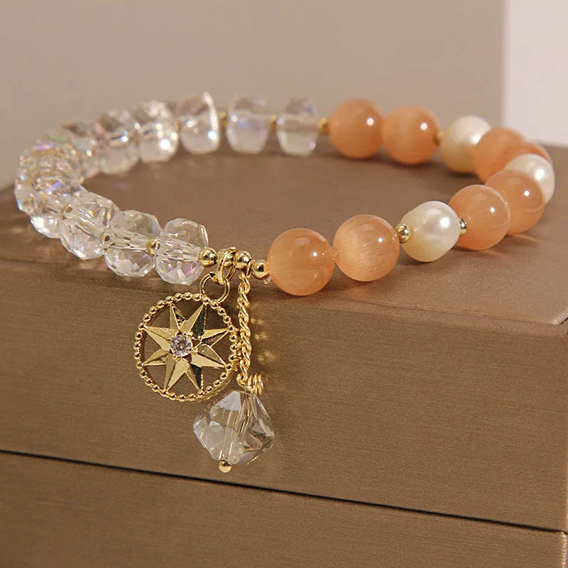 Orange eight Awn star women's bracelet with gold-plated inlay setting and opal crystal accents
