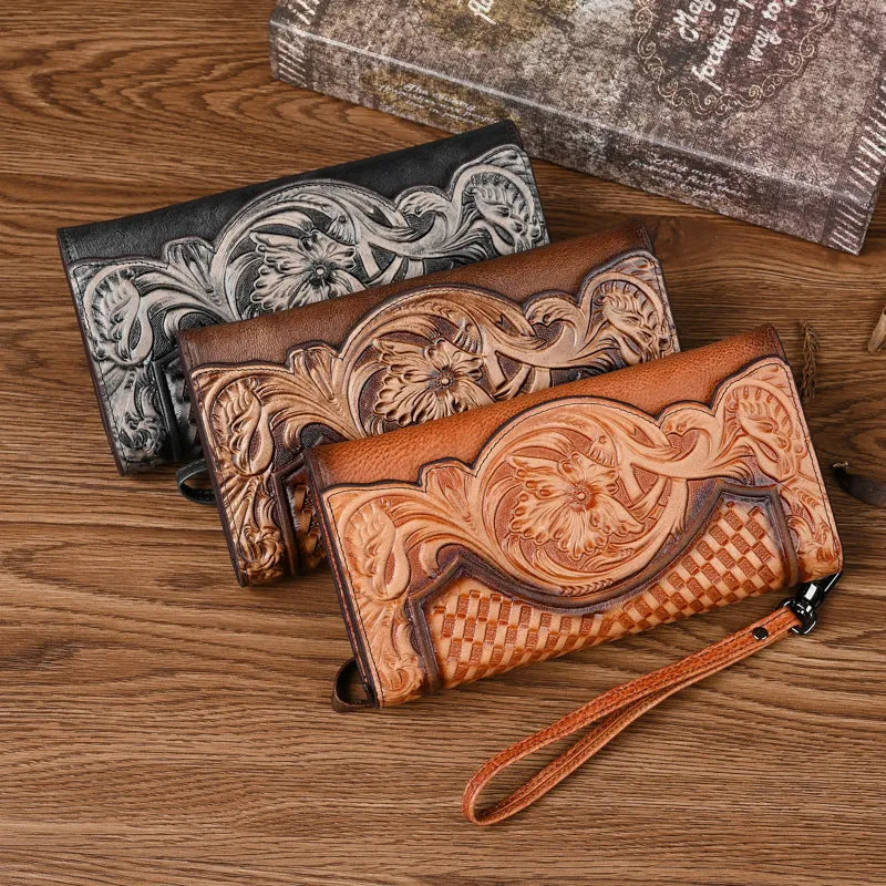 Retro brown embossed Chinese floral pattern on a genuine leather tri-fold women's wallet.