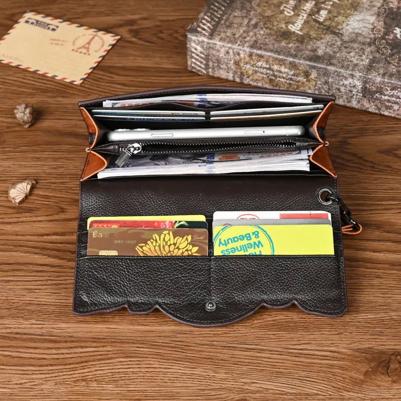 Retro brown embossed Chinese floral pattern on a genuine leather tri-fold women's wallet.