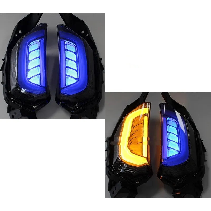 Pair of LED turn signal lights for Yamaha NMAX155 scooter in plastic housing.