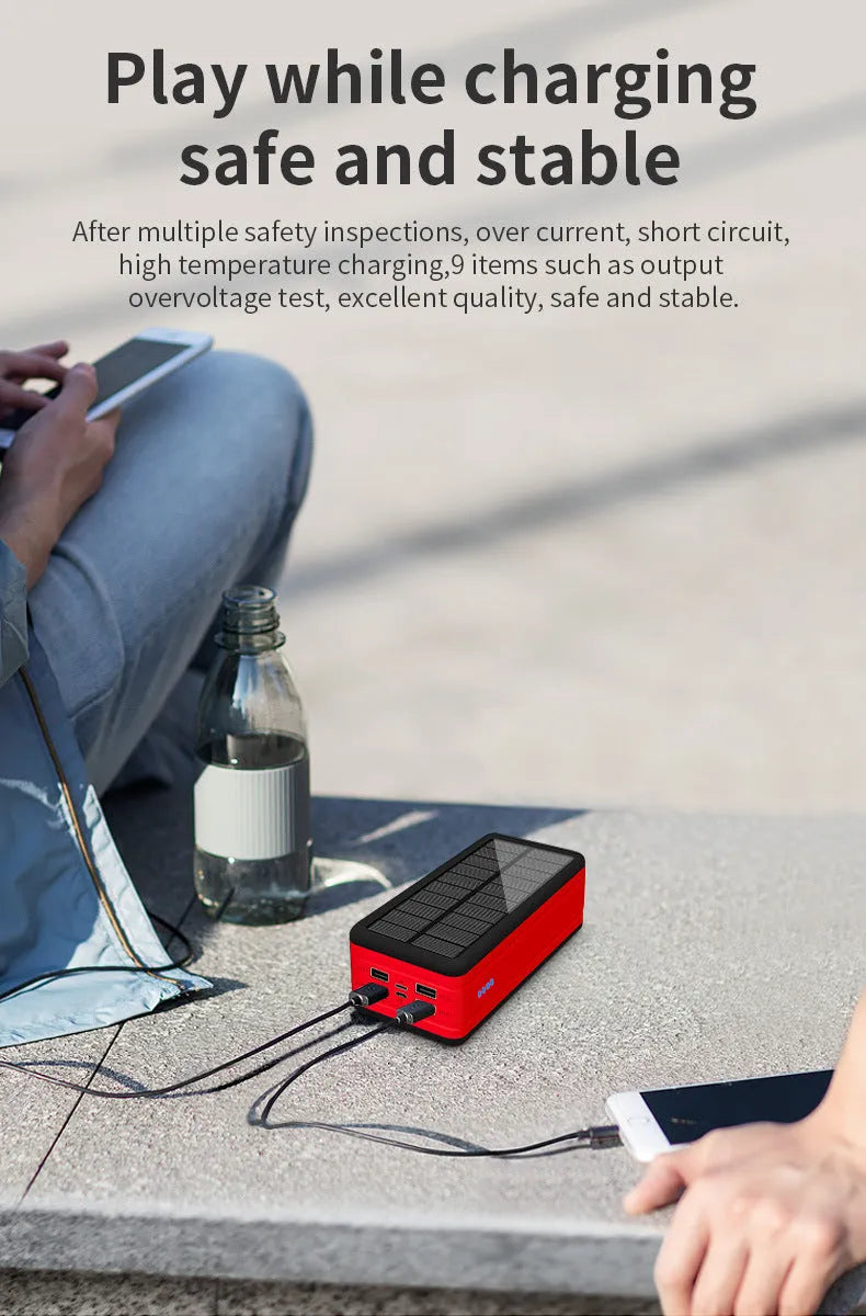 Large capacity solar wireless power bank in black with coloured accents showing solar panel and wireless charging surface
