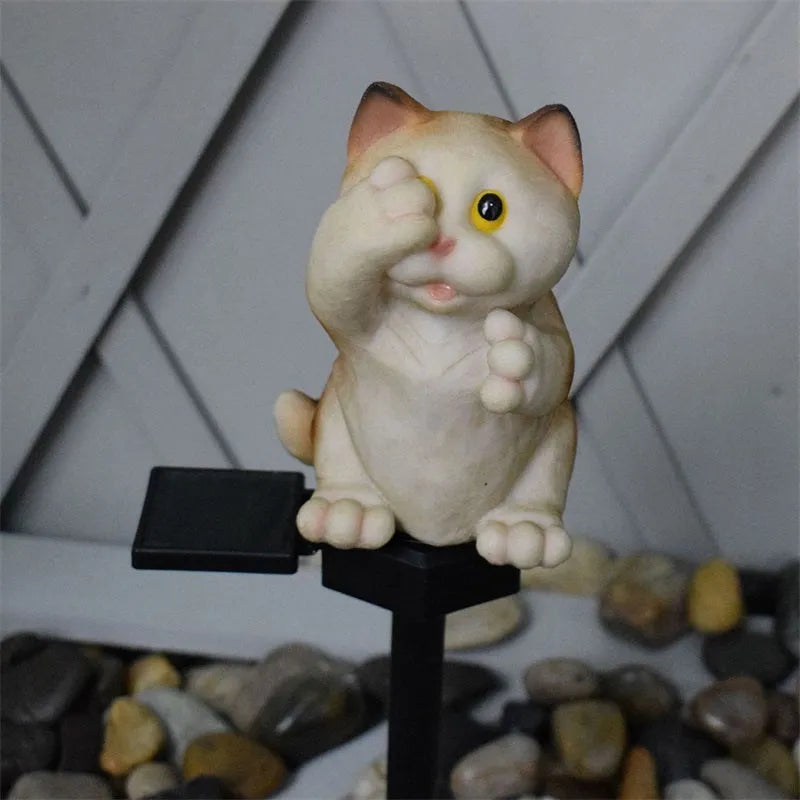 Brown resin cat-shaped solar garden light with LED, for courtyard decoration.