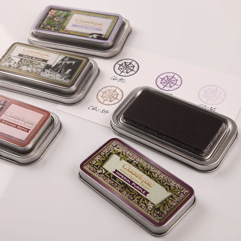 Rectangular notebook stamp pad with oily ink in five colour options