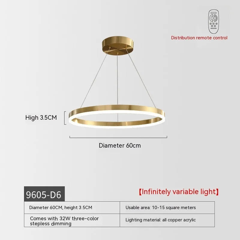 Modern copper circle chandelier with acrylic elements in a Nordic light luxury style for a living room.