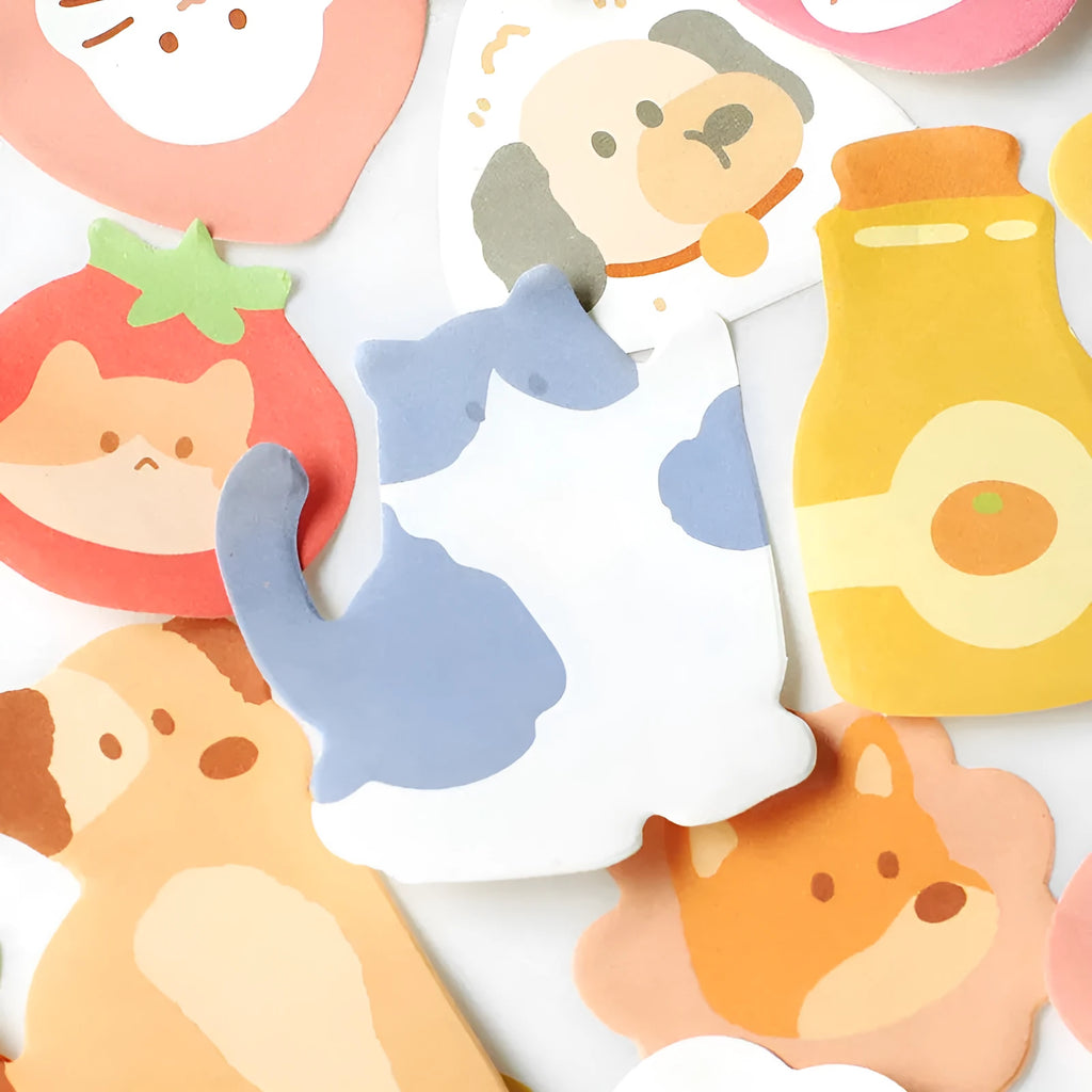 Small animal-shaped sticky note pad with designs like a kitten, puppy, bunny, and sea otter.