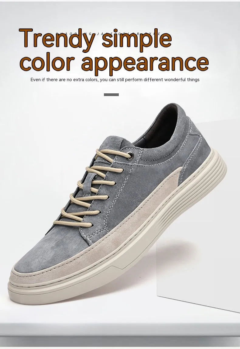 Men's grey pigskin leather low-top casual skate shoes with a round toe and rubber sole on a white background.