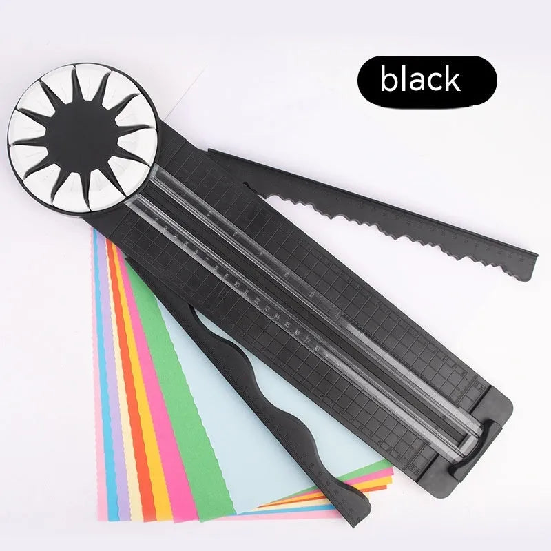 Pink and black 12-in-1 multifunctional plastic paper cutting machine on a white background.